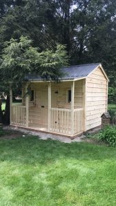 high gable shed with side porch